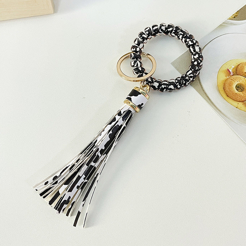 Brazalete al por mayor cable PU Leopardo Tassel Anti-Lost Keychains